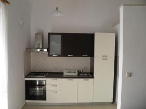 Kuchyň nebo kuchyňský kout v ubytování Seaside apartments