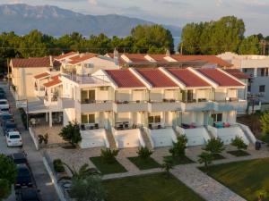 an aerial view of a house with mountains in the background at Kassiani Studios in Keramoti