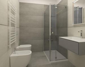 a bathroom with a toilet and a sink and a shower at N'Agorà B&B in Naples