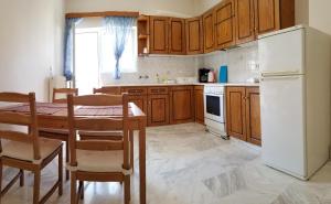 Kuchyň nebo kuchyňský kout v ubytování Galini Apartment