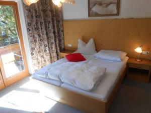 Ein Bett oder Betten in einem Zimmer der Unterkunft Herberge Aulon