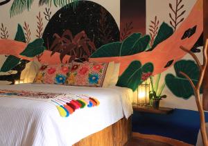 Letto o letti in una camera di Hotel Zentik Project & Saline Cave