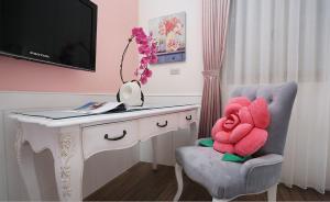 TV a/nebo společenská místnost v ubytování Campestral Garden