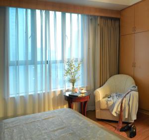 Cama o camas de una habitación en New Harbour Service Apartments