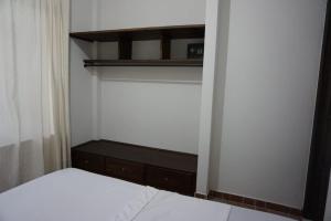 Voodi või voodid majutusasutuse Hostal Suna Vito toas