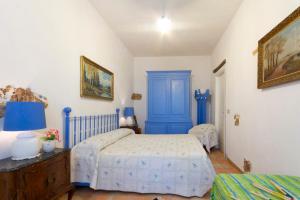Posteľ alebo postele v izbe v ubytovaní Villa Baglio