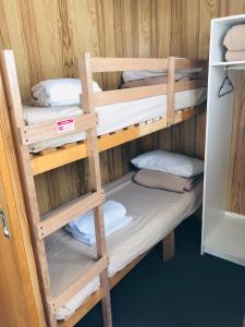 a bunk room with four bunk beds in it at Discovery Parks - Hadspen in Hadspen