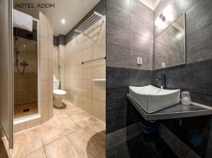 Koupelna v ubytování Hotel Otakar