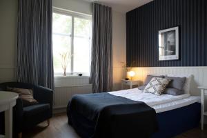 Postel nebo postele na pokoji v ubytování Tyringe Kurhotell + 37 fotografií