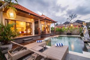 an image of a villa with a swimming pool at The Aruna Villa by Purely in Ubud
