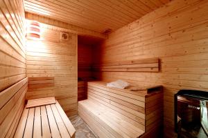 Postel nebo postele na pokoji v ubytování Hotel Otakar
