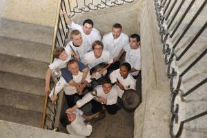 a group of people posing for a picture at Château Attisholz in Riedholz