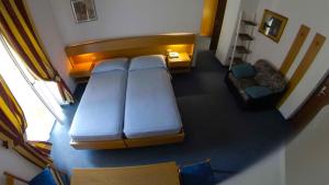 Katil atau katil-katil dalam bilik di Hotel Alberello