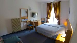 Katil atau katil-katil dalam bilik di Hotel Alberello