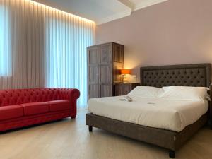 Postel nebo postele na pokoji v ubytování Palazzo Dei Mercanti - Dimora & Spa