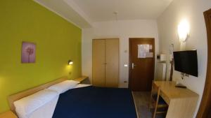 Katil atau katil-katil dalam bilik di Hotel Alberello