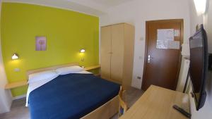Katil atau katil-katil dalam bilik di Hotel Alberello