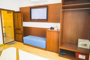 Giường trong phòng chung tại Dai A Hotel