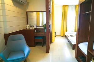 Giường trong phòng chung tại Dai A Hotel