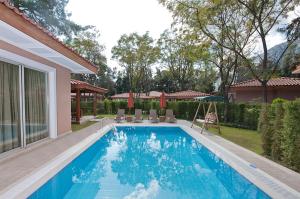 Bazén v ubytování Akka Antedon Hotel - Premium Ultra All Inclusive nebo v jeho okolí