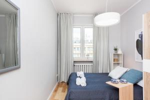 Posteľ alebo postele v izbe v ubytovaní Apartments City Center by Noclegi Renters