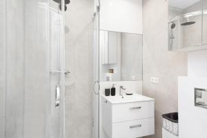 Kúpeľňa v ubytovaní Apartments City Center by Noclegi Renters