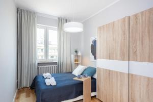 Posteľ alebo postele v izbe v ubytovaní Apartments City Center by Noclegi Renters