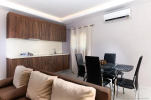 Posedenie v ubytovaní Seashore Stream Suites