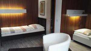 Voodi või voodid majutusasutuse Hotel Römerhof toas