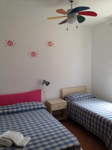 Postel nebo postele na pokoji v ubytování Residence La Giungla