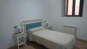Postel nebo postele na pokoji v ubytování Almena de San Segundo
