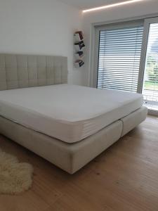 En eller flere senge i et værelse på Glanzvoller - Deine Auszeit