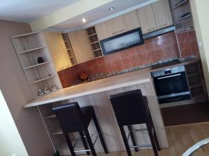 Kuchyň nebo kuchyňský kout v ubytování Apartman House Annesa