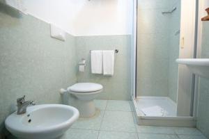 Um banheiro em La Carrozza d'Oro
