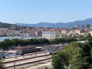 a view of a city with a train station at Apartment Felix in Split