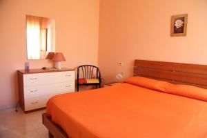 Postel nebo postele na pokoji v ubytování B&B La Villetta