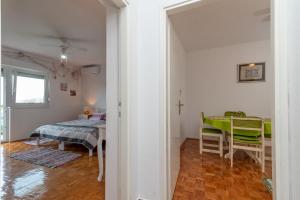 Postel nebo postele na pokoji v ubytování Apartment Radja