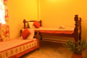 Letto o letti in una camera di Sneh Deep Guest House