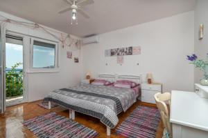 Postel nebo postele na pokoji v ubytování Apartment Radja