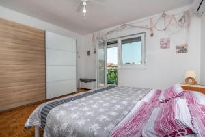 Postel nebo postele na pokoji v ubytování Apartment Radja