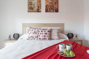 Posteľ alebo postele v izbe v ubytovaní Homes&Go Nova Pineda Alto