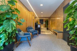 The lobby or reception area at Hotel Spot Family Suites