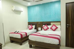 Letto o letti in una camera di Hotel Plaza Executive - near BKC