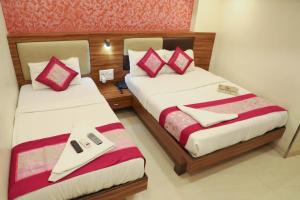 Letto o letti in una camera di Hotel Plaza Executive - near BKC