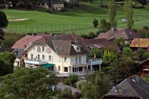 an aerial view of a house with many roofs at Résidence Florimontane in Talloires