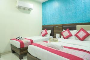 Letto o letti in una camera di Hotel Plaza Executive - near BKC