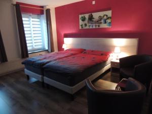 Ein Bett oder Betten in einem Zimmer der Unterkunft Hotel de la Gare