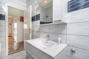 Koupelna v ubytování Apartment Radja