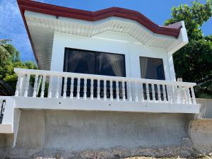 Balkón nebo terasa v ubytování LUNA OSLOB TRAVELLERS INN - Beach Front