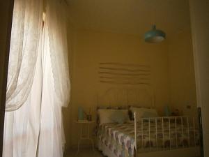 Postel nebo postele na pokoji v ubytování B&B Abruzzo Mare e Monti